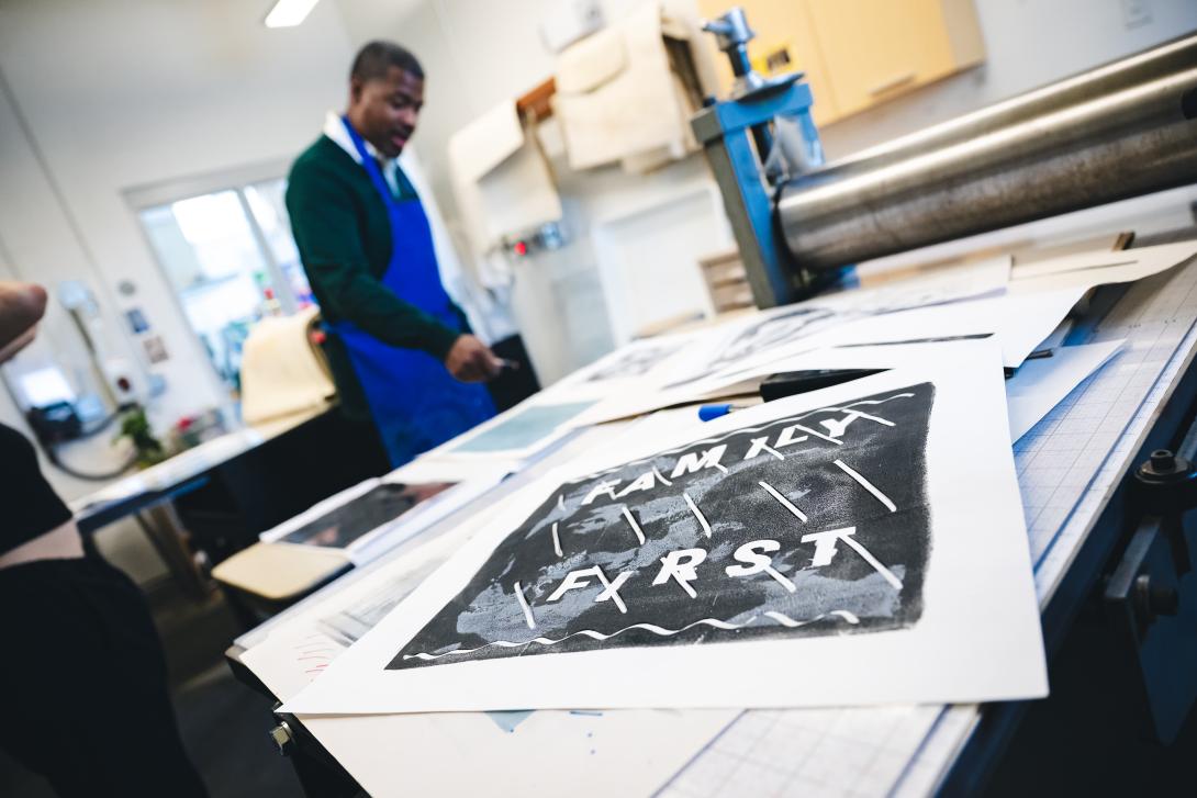 A Chris LaMont monoprint with the words "Family First"